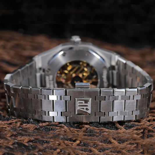 Stainless Steel Green Dial Luxury Watch with Emerald Accents and Open Heart Design SwanDiamond